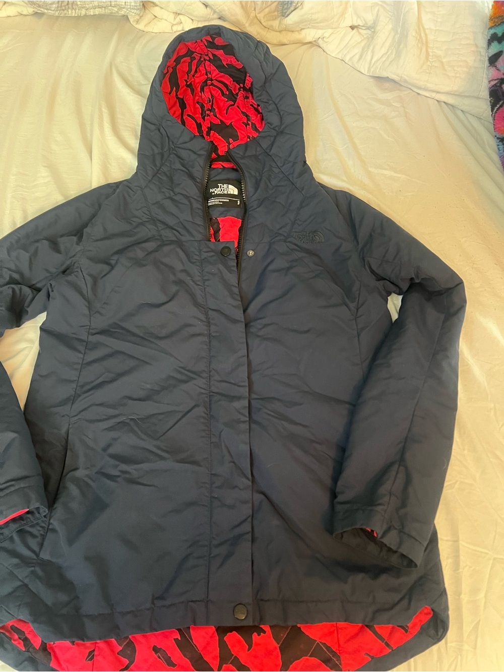 The North Face Women's Navy Hooded Puffer with pink Patterned Lining